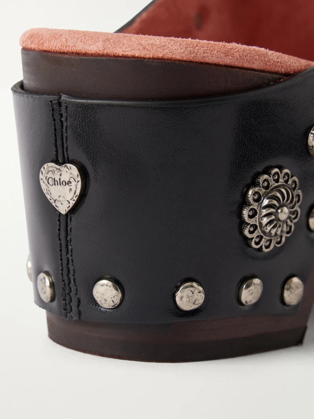 Close-up detail of the Chloé Talis Embellished Leather Clogs