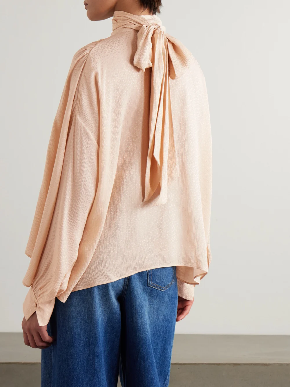 Back view of the Chloé Tie-detailed Gathered Silk-blend Jacquard Blouse