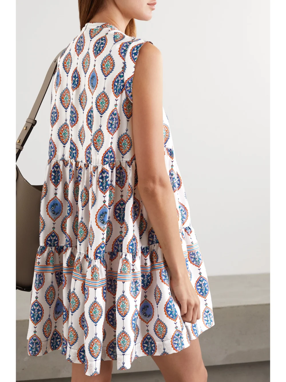 Back view of the Chloé Tiered Printed Silk Crepe De Chine Mini Dress