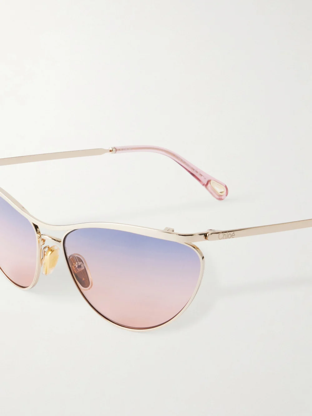 Close-up detail of the Chloé Uma Cat-eye Gold-tone Sunglasses