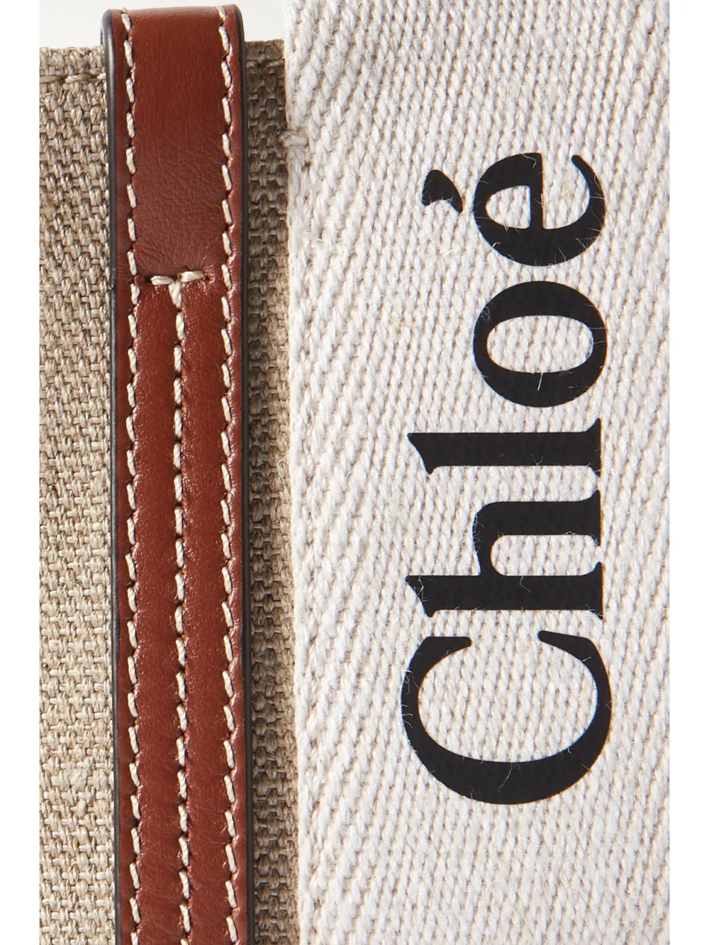 Close-up detail of the Chloé Woody Mini Leather-trimmed Linen Tote