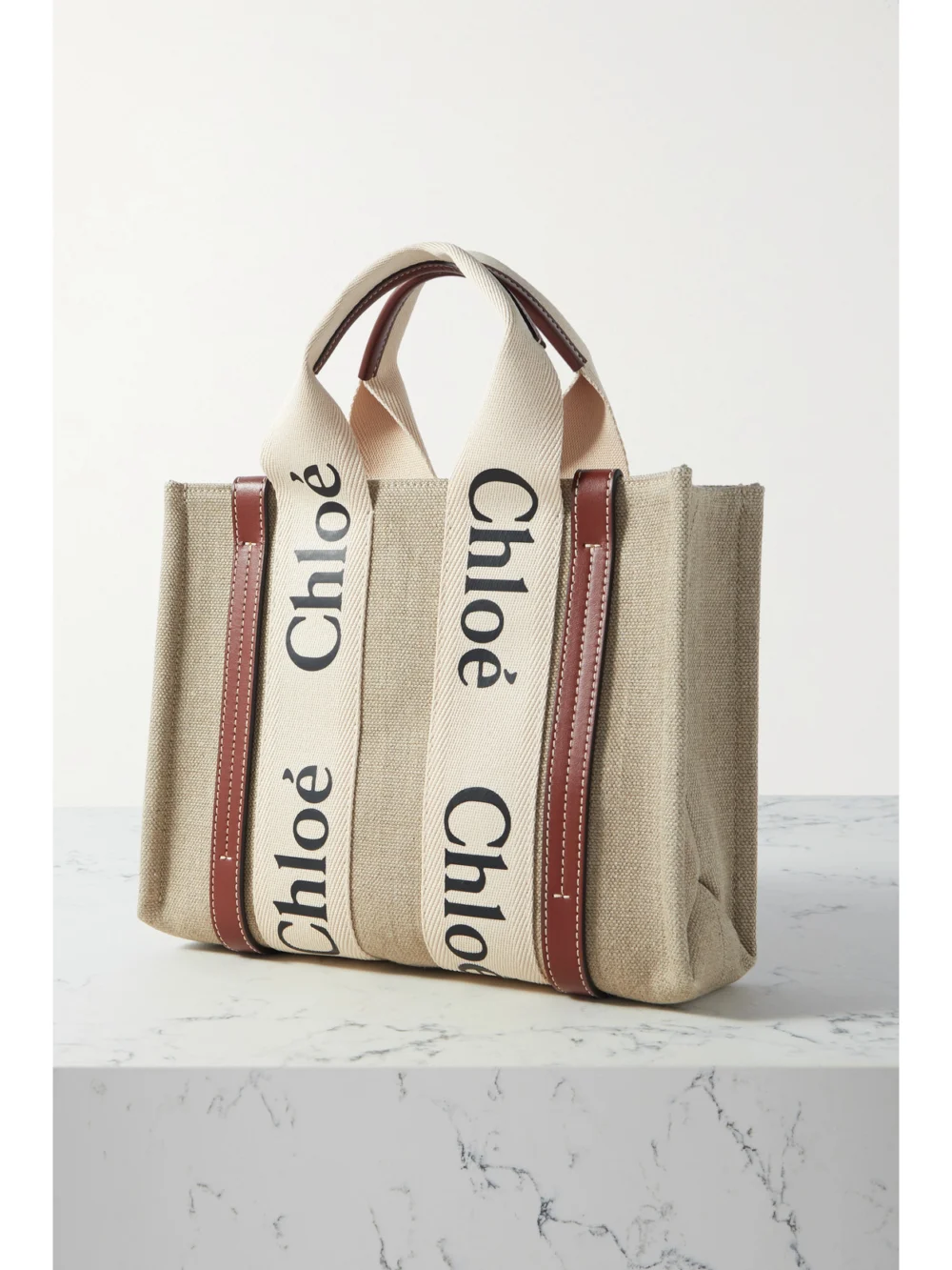 Back view of the Chloé Woody Small Embroidered Leather-trimmed Linen Tote