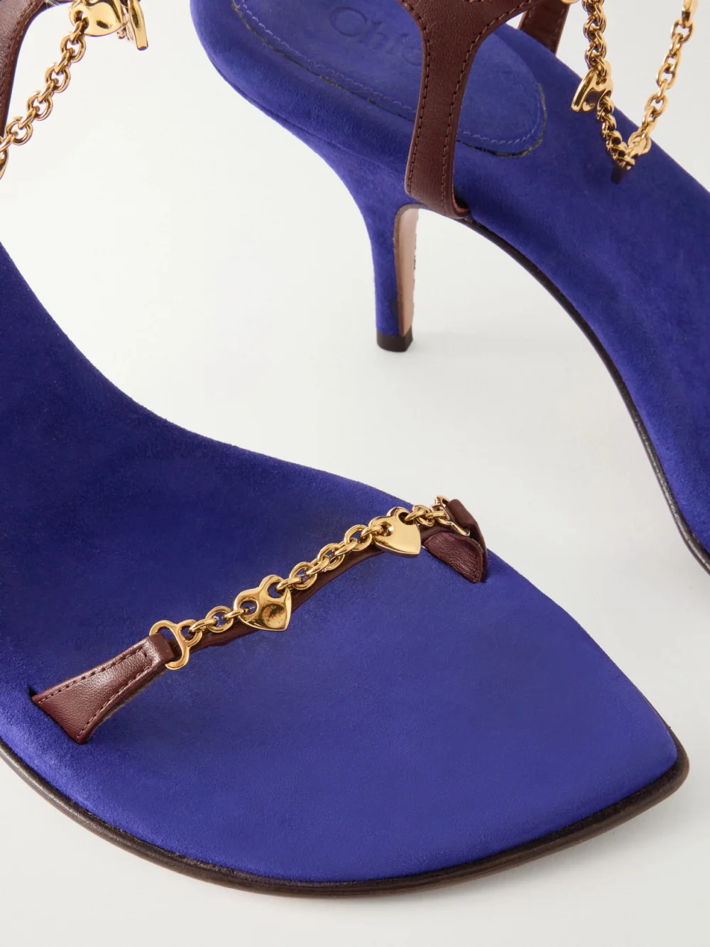 Close-up detail of the Chloé Zia Chain-embellished Leather Sandals