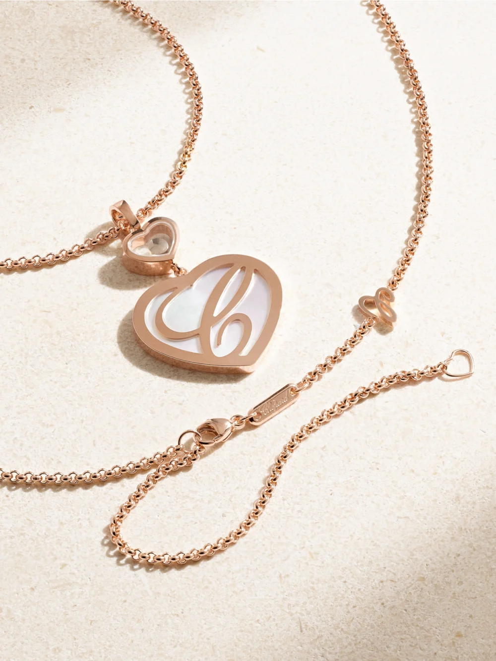 Back view of the Chopard Happy Hearts 18-karat Rose Gold, Mother-of-pearl and Diamond Necklace