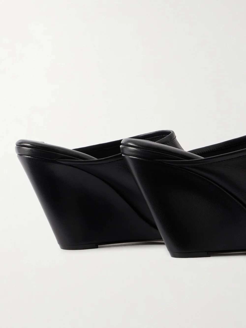 Close-up detail of the Christen 75 Stretch Leather Wedge Mules