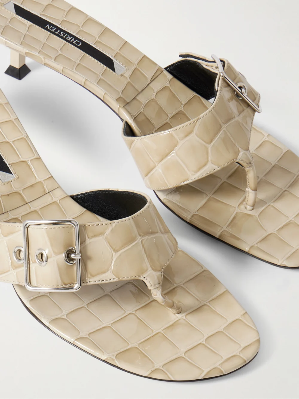Close-up detail of the Christen Helix Buckled Croc-effect Patent-leather Sandals