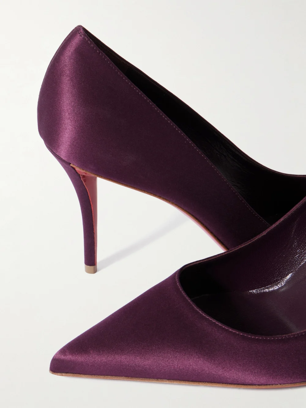 Close-up detail of the Christian Louboutin Apostropha 80 Satin Pumps