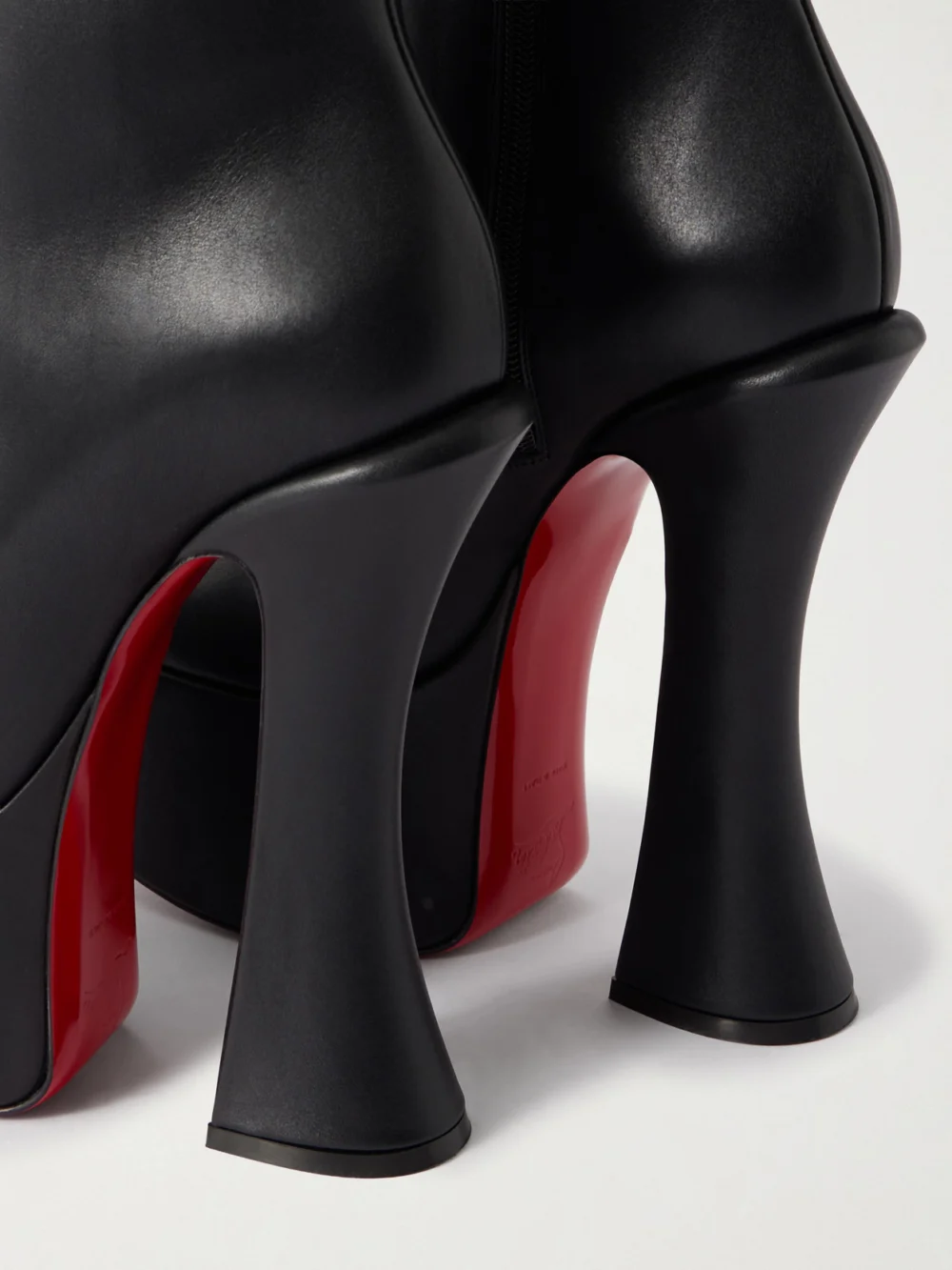 Close-up detail of the Christian Louboutin Aquabootie 160 Leather Platform Ankle Boots
