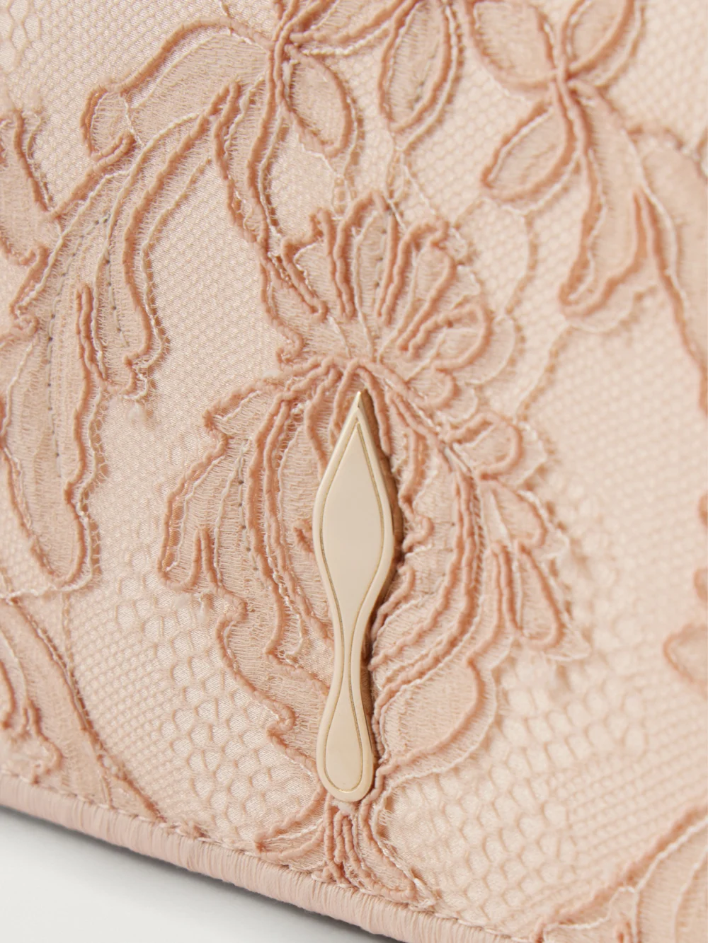 Close-up detail of the Christian Louboutin Bettina Lace-trimmed Satin Clutch
