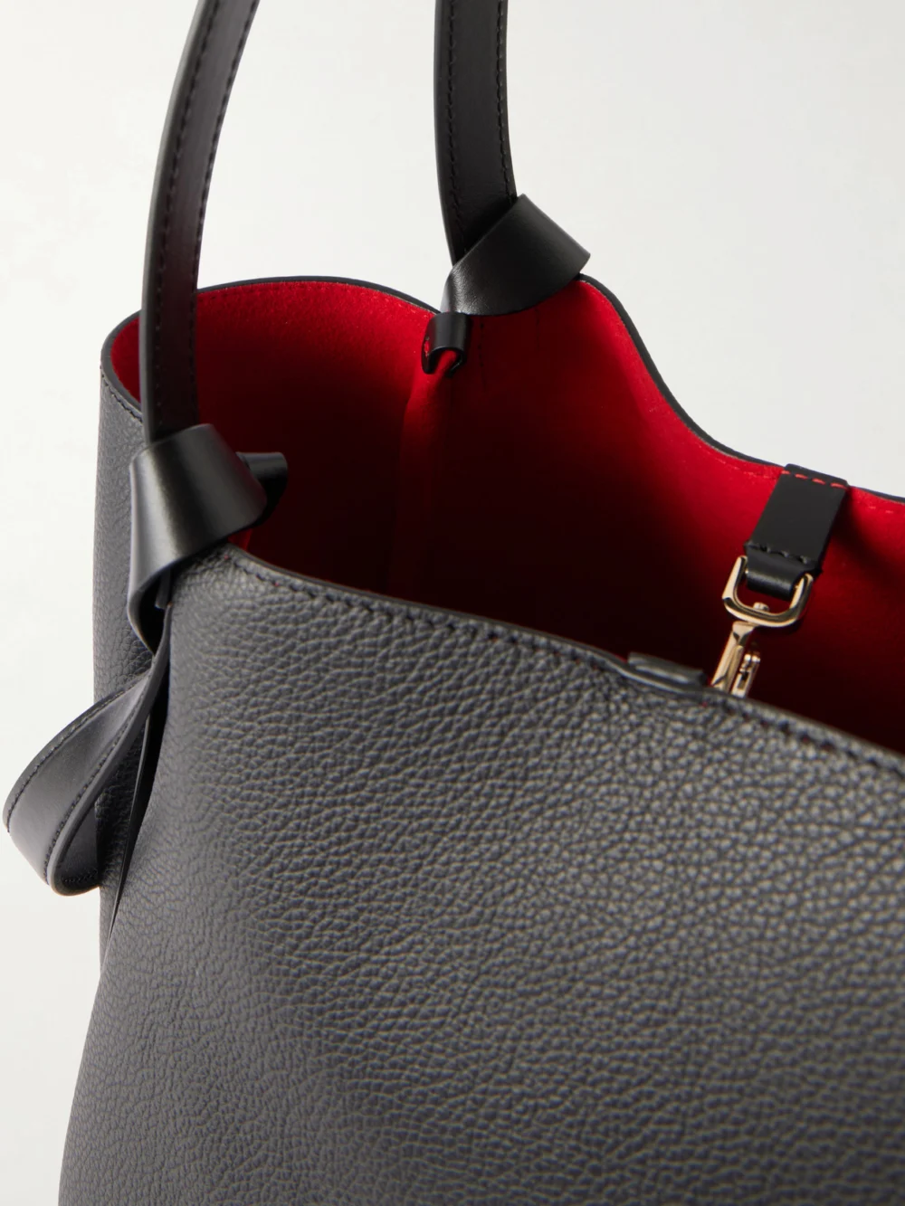 Close-up detail of the Christian Louboutin Bettina Small Embellished Leather Tote