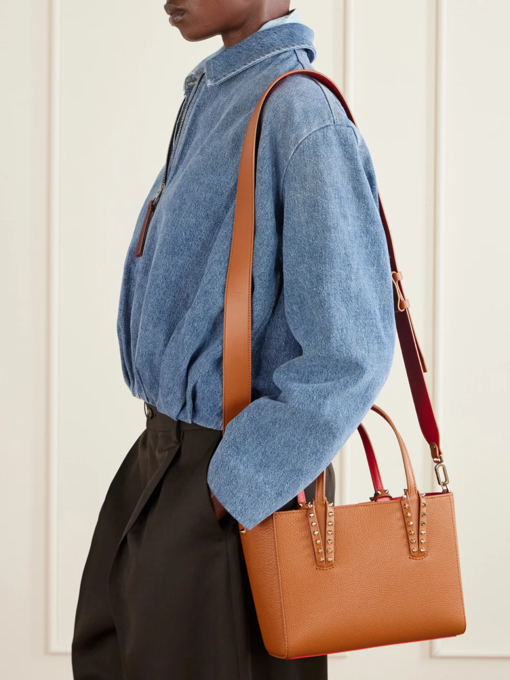 Christian Louboutin Cabata Mini Spiked Textured-leather Tote, styled view