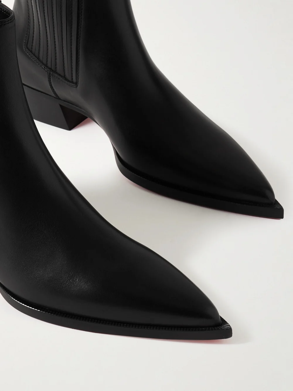 Close-up detail of the Christian Louboutin Cheliviss 35 Leather Chelsea Boots