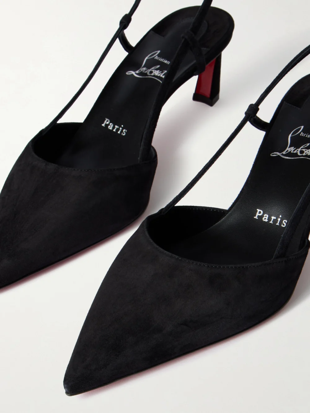 Close-up detail of the Christian Louboutin Condoroline 55 Cutout Suede Slingback Pumps