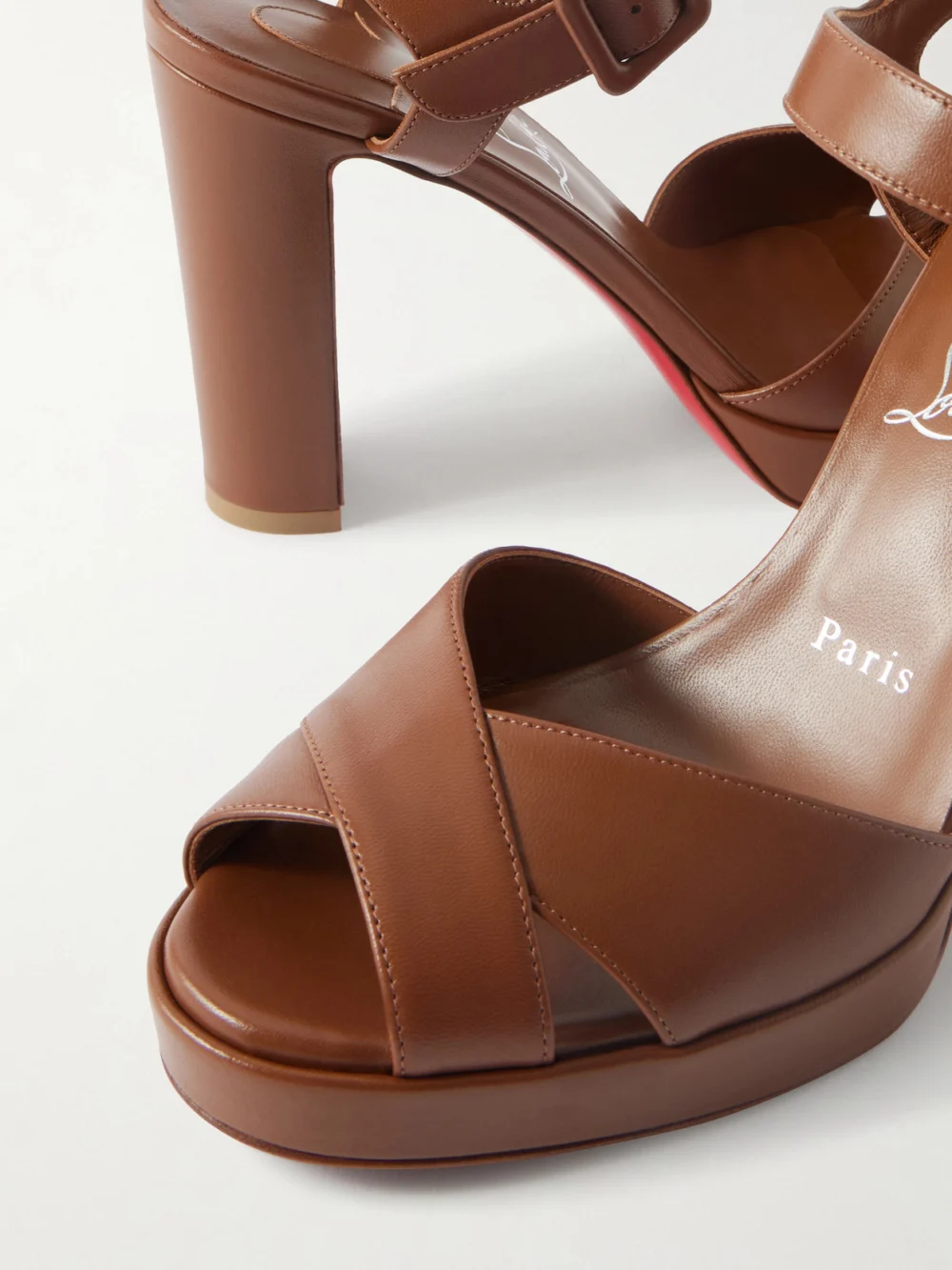 Close-up detail of the Christian Louboutin Cora 100 Leather Platform Sandals