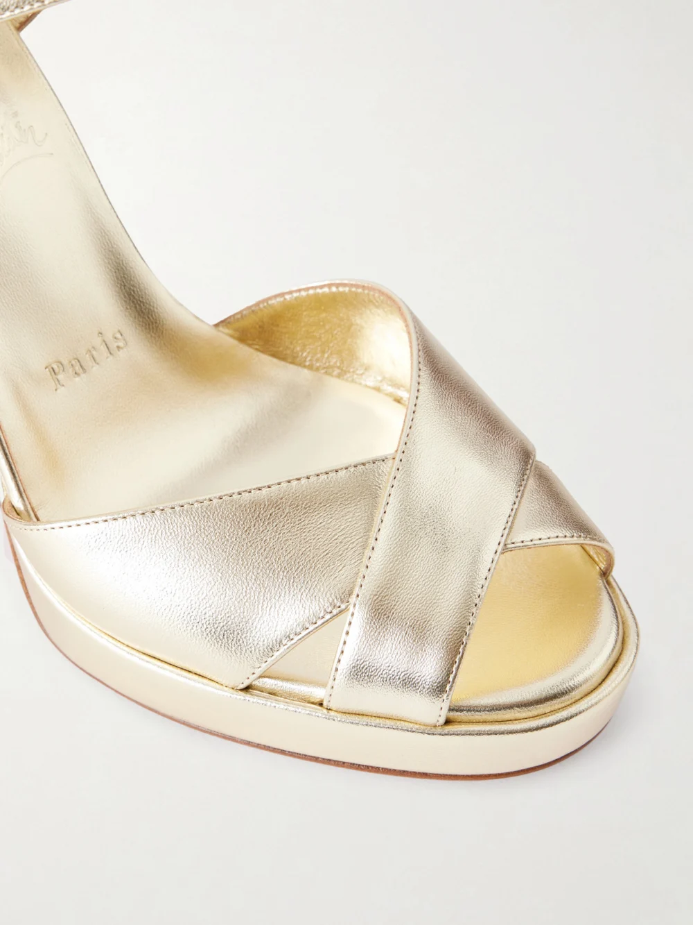 Close-up detail of the Christian Louboutin Cora 100 Leather Platform Sandals