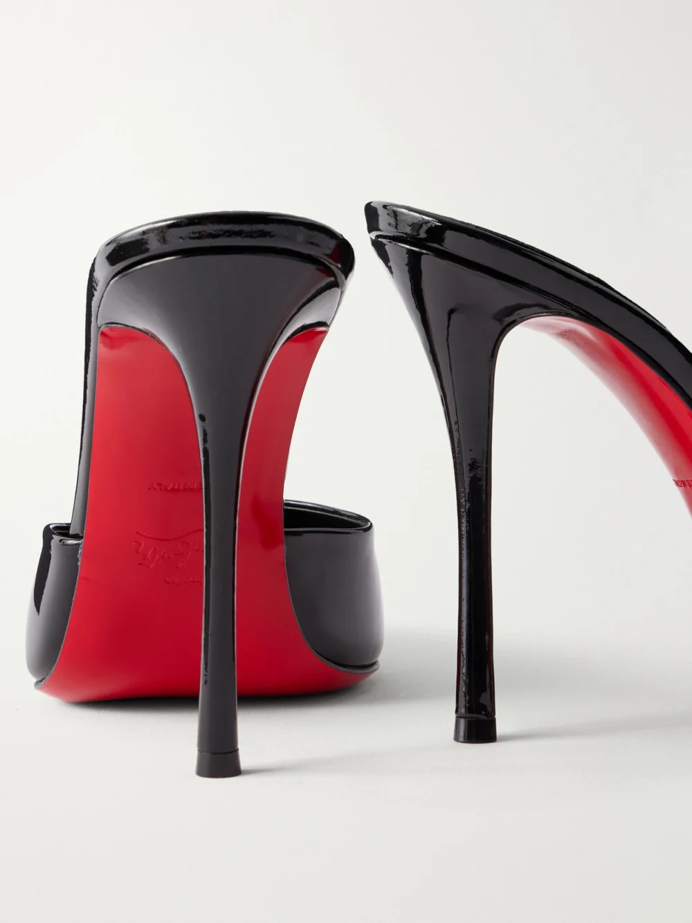 Close-up detail of the Christian Louboutin Dolly 100 Patent-leather Pumps
