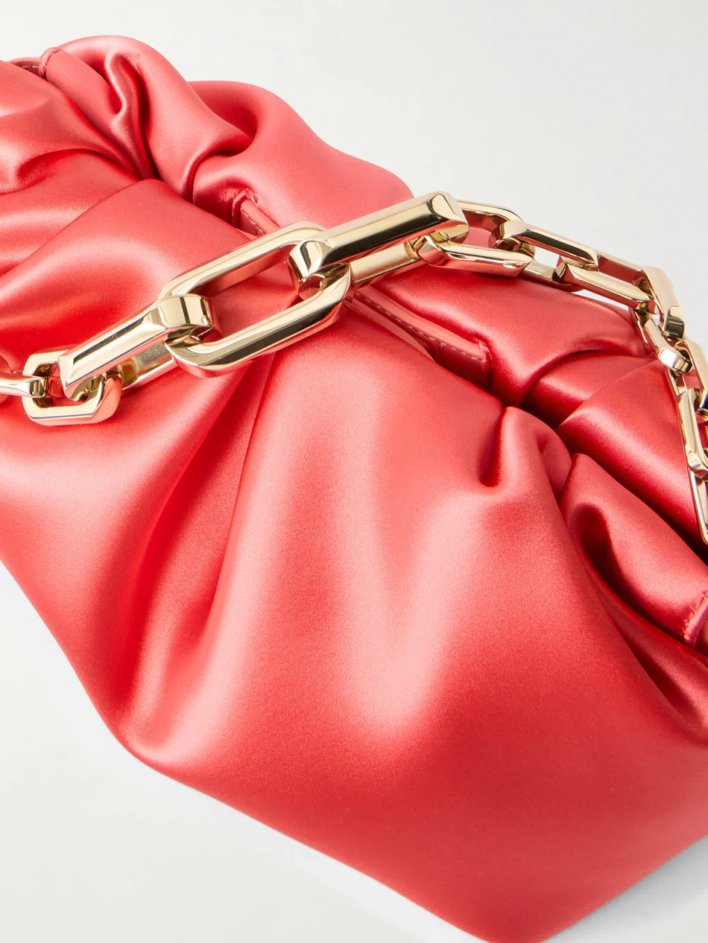 Close-up detail of the Christian Louboutin Eva Small Satin Clutch