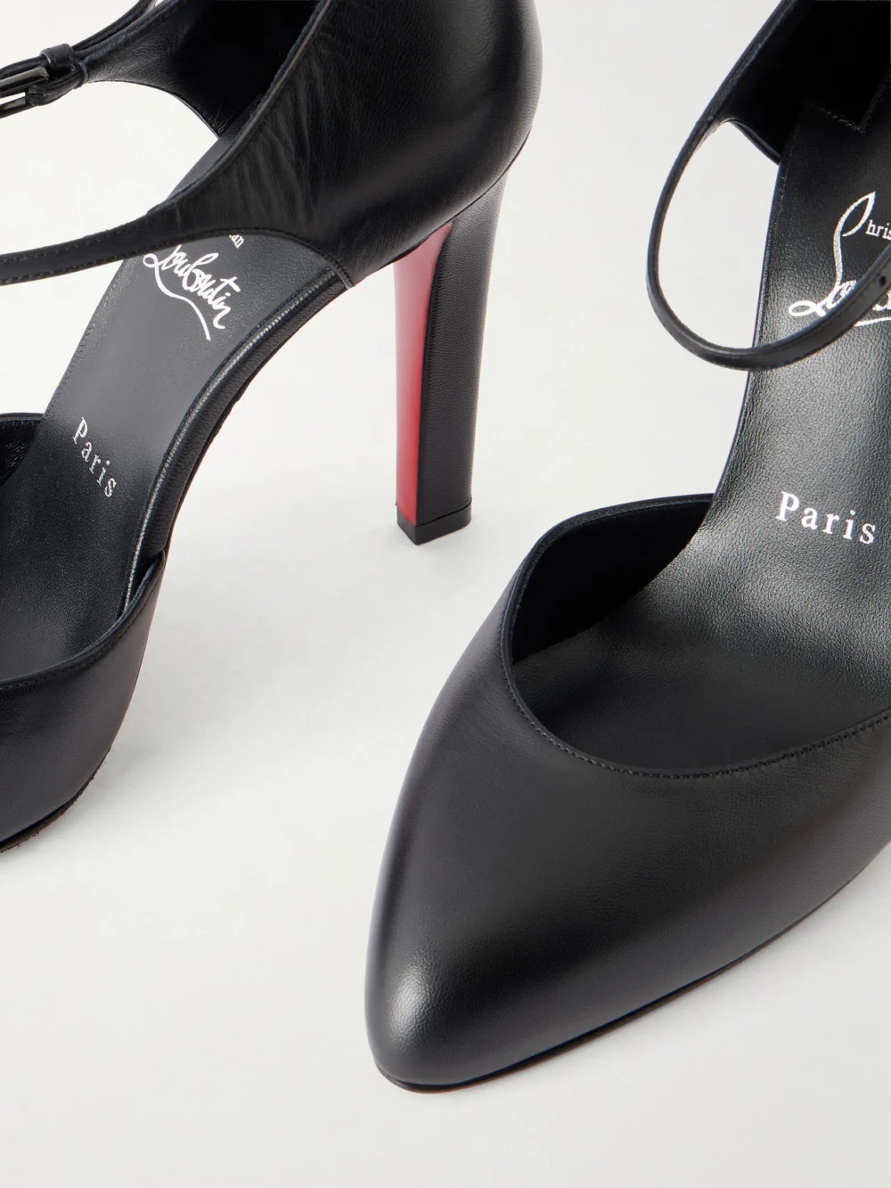 Close-up detail of the Christian Louboutin Fanny 100 Leather Pumps