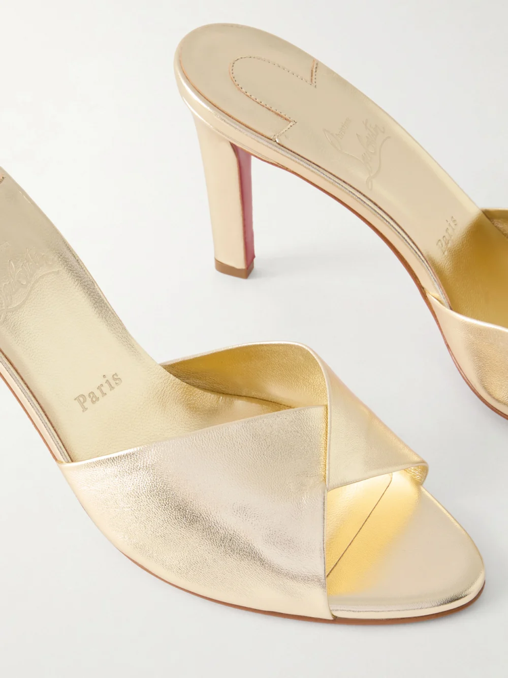 Close-up detail of the Christian Louboutin Fanny 85 Metallic Leather Sandals