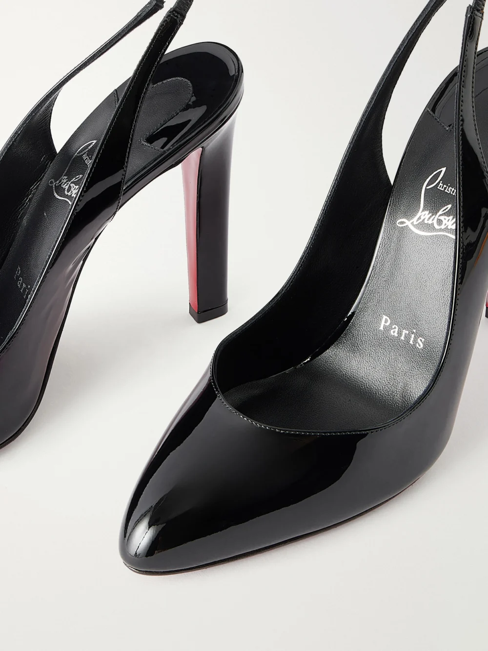 Close-up detail of the Christian Louboutin Fannylove 100 Patent-leather Slingback Pumps
