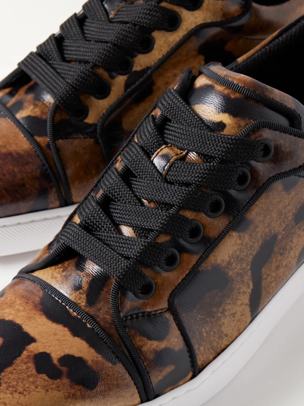 Close-up detail of the Christian Louboutin Fun Louise Junior Leopard-print Leather Sneakers