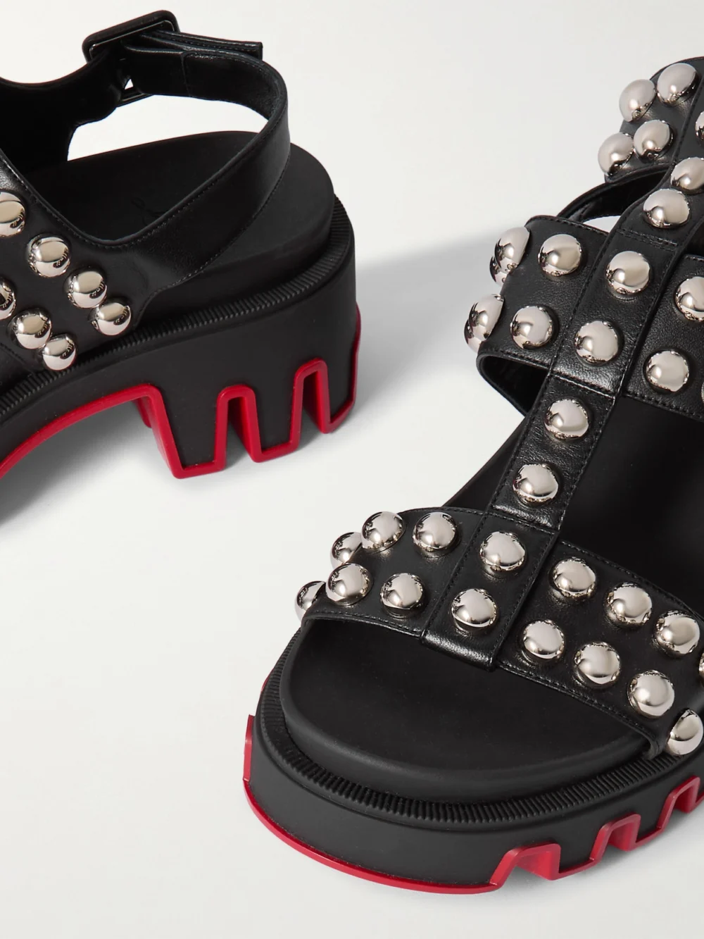Close-up detail of the Christian Louboutin Gladiadune Studded Leather Sandals