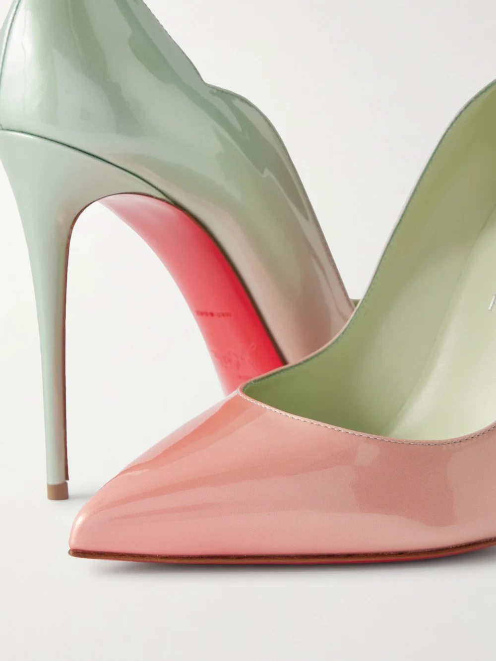 Close-up detail of the Christian Louboutin Hot Chick 100 Dégradé Patent-leather Pumps