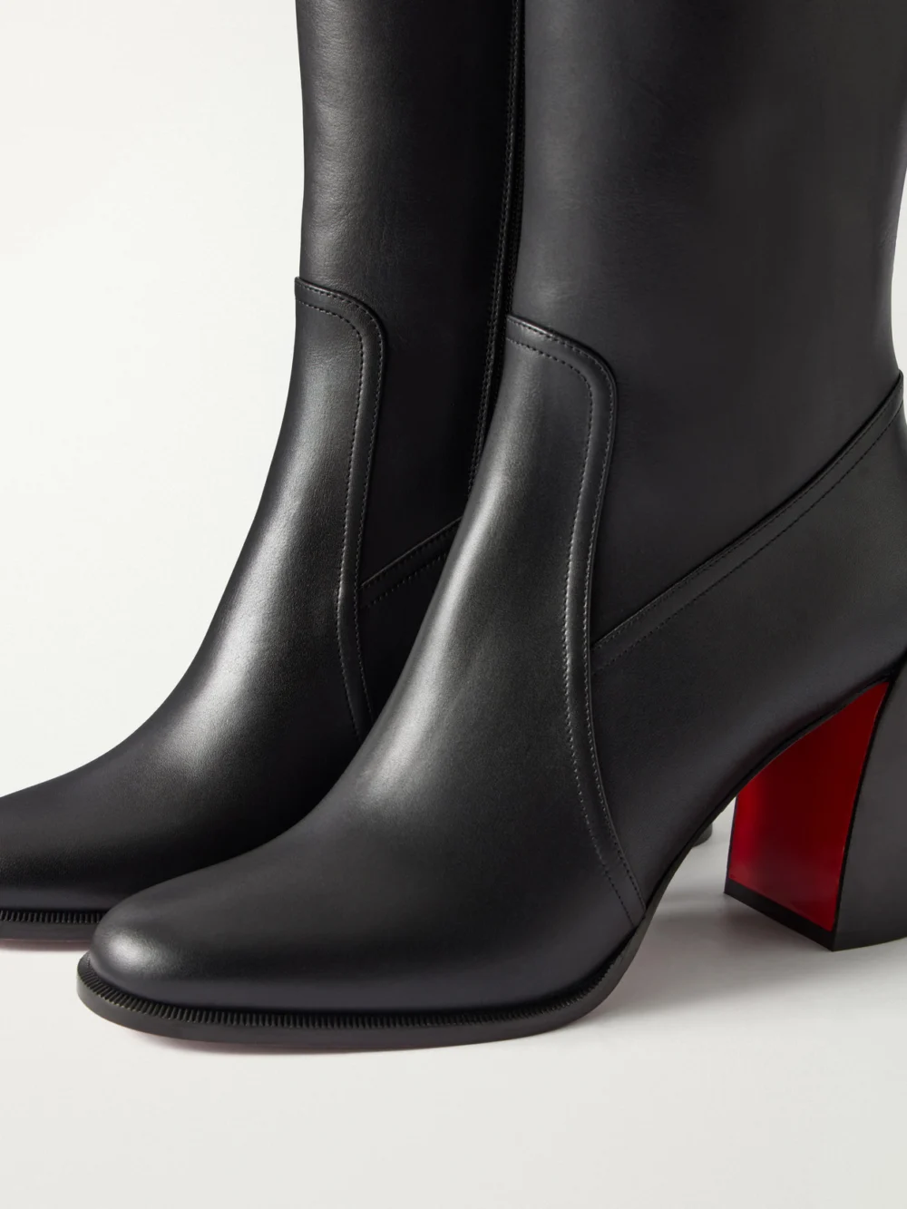 Close-up detail of the Christian Louboutin Iranina 85 Leather Knee Boots