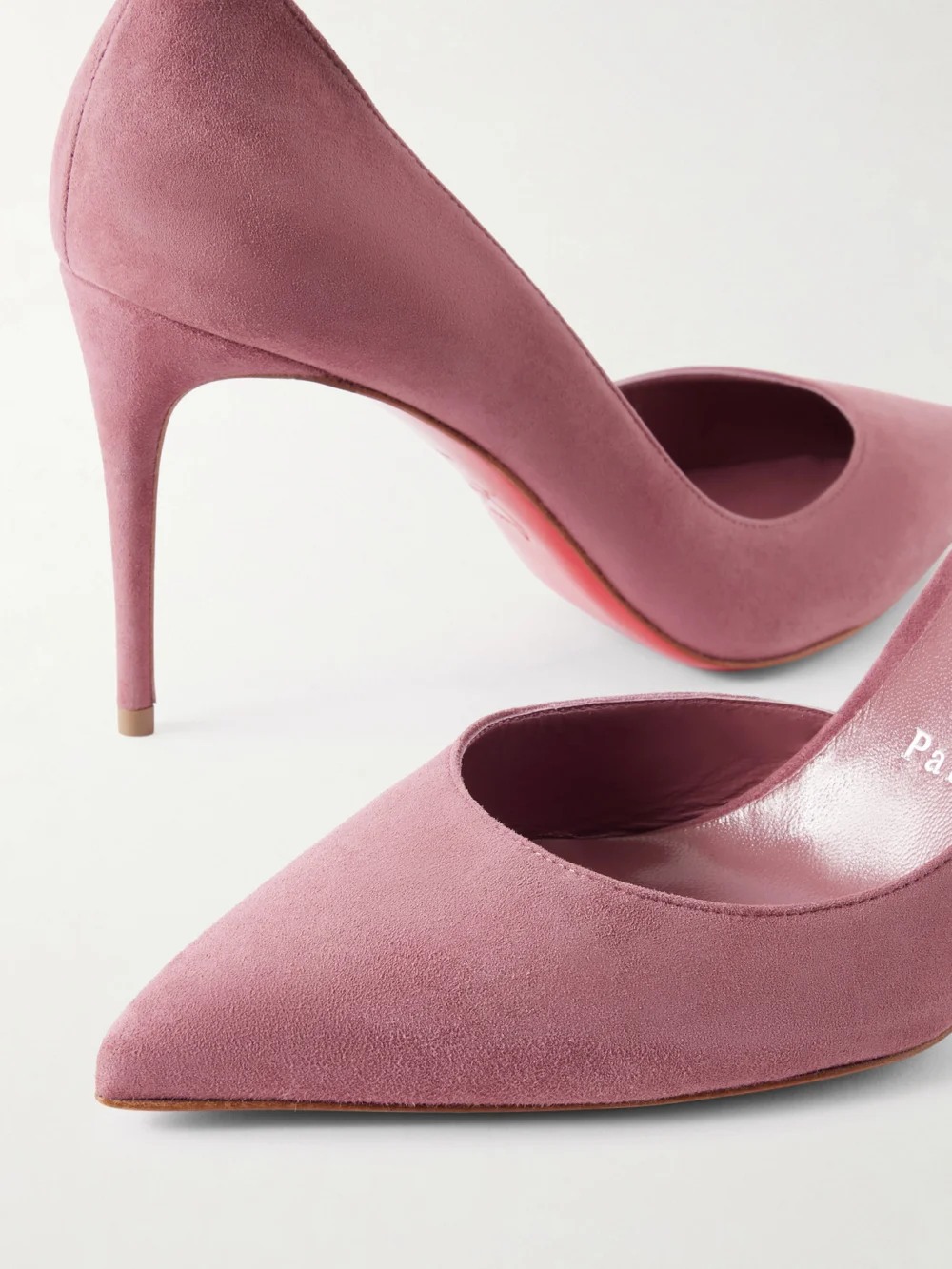 Close-up detail of the Christian Louboutin Iriza 85 Suede Pumps