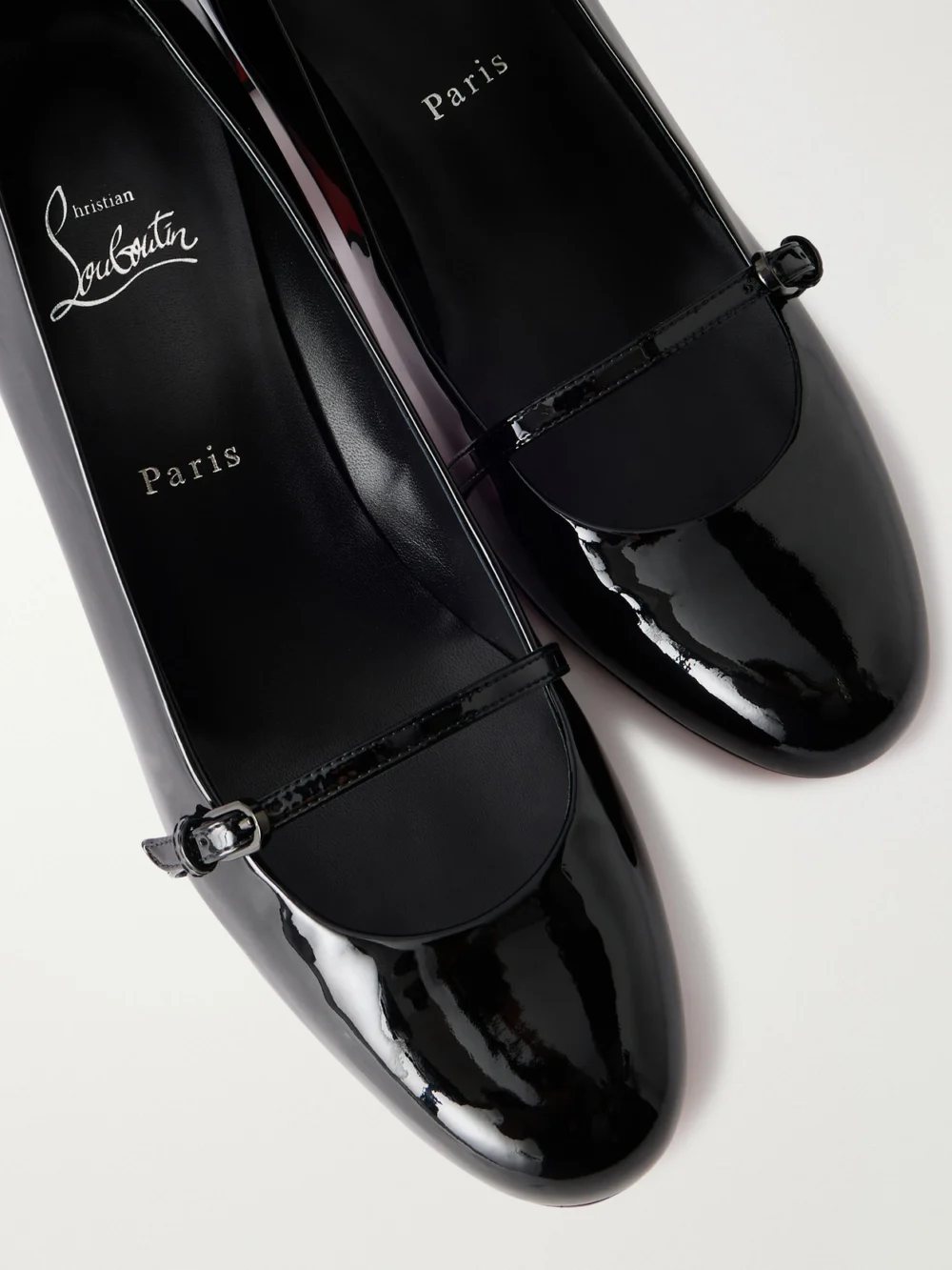 Close-up detail of the Christian Louboutin Jane Nina 55 Patent-leather Pumps