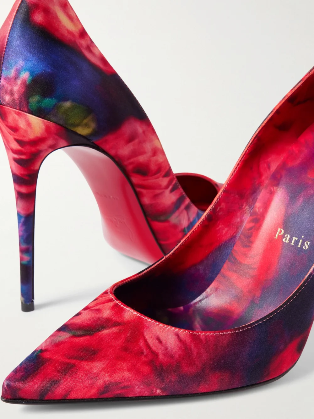 Close-up detail of the Christian Louboutin Kate 100 Floral-print Satin-crepe Pumps