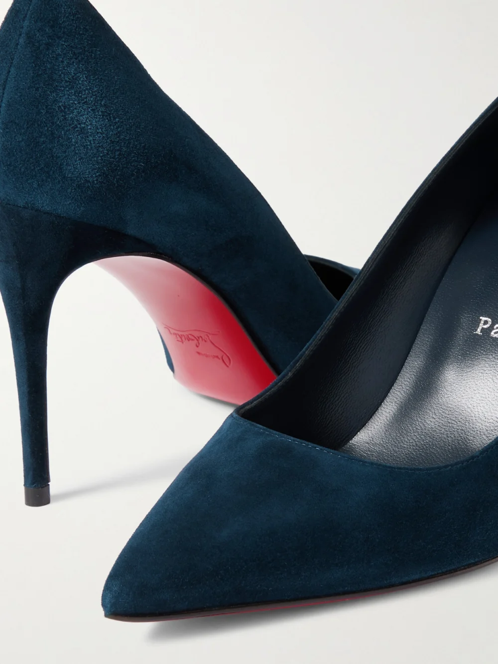 Close-up detail of the Christian Louboutin Kate 85 Suede Point-toe Pumps