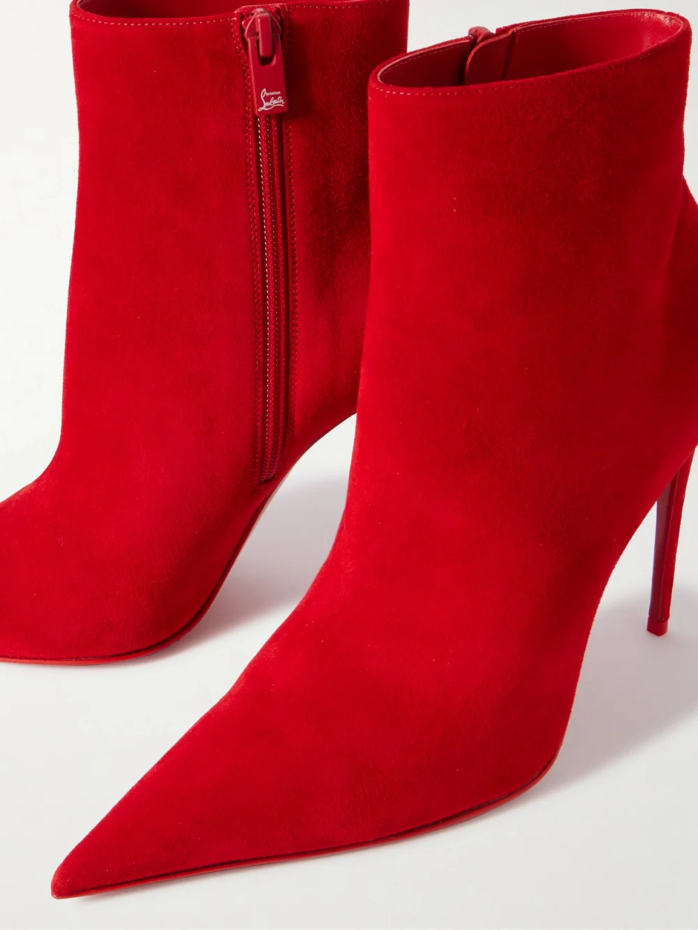 Close-up detail of the Christian Louboutin Kate Max 100 Suede Ankle Boots