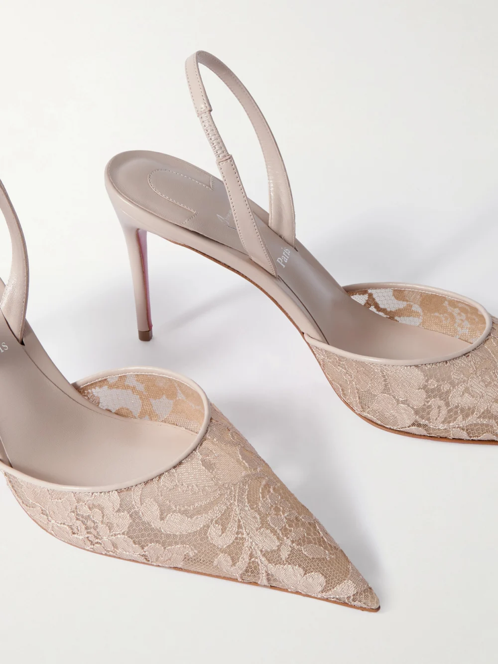 Close-up detail of the Christian Louboutin Kate Max 85 Leather-trimmed Lace Slingback Pumps