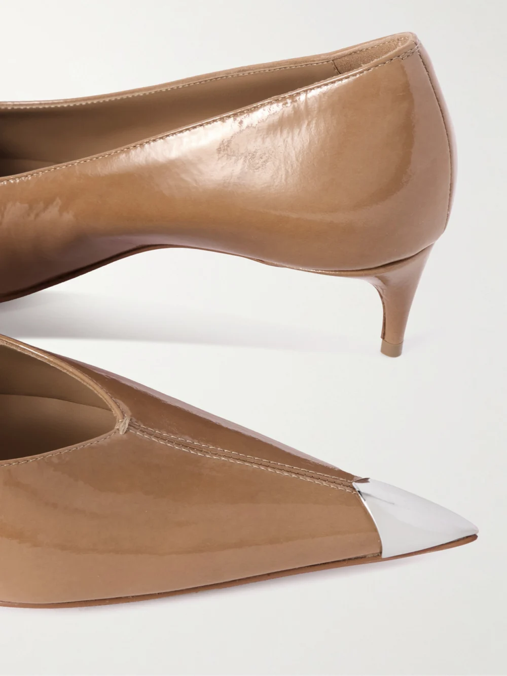 Close-up detail of the Christian Louboutin Katissima 45 Embellished Patent-leather Point-toe Pumps