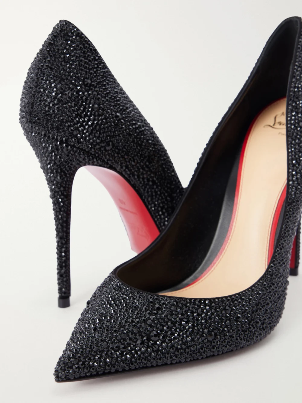 Close-up detail of the Christian Louboutin La Pigalle 100 Crystal-embellished Leather Pumps