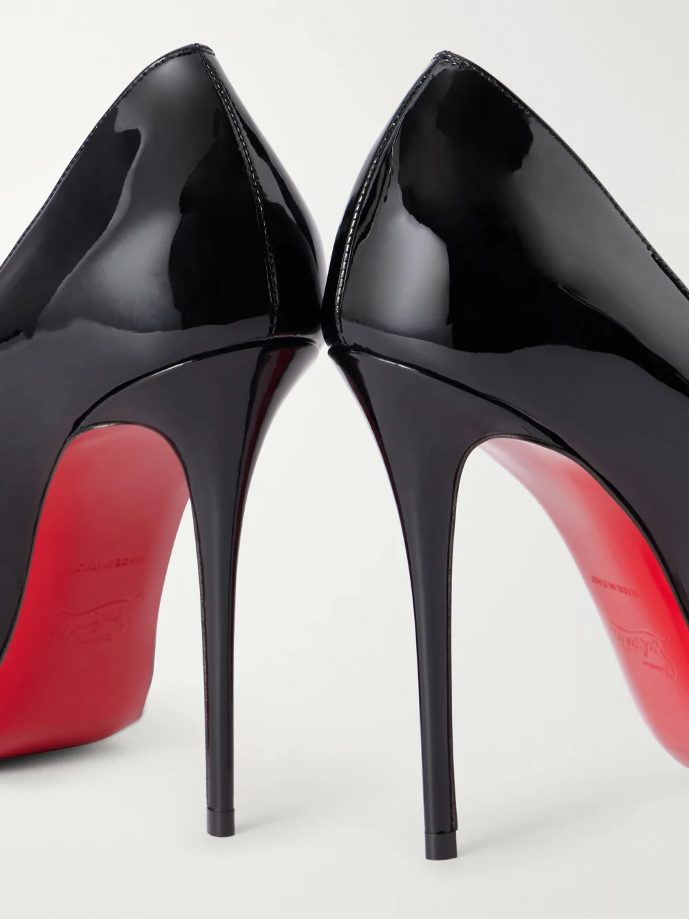 Close-up detail of the Christian Louboutin La Pigalle 100 Patent-leather Pumps