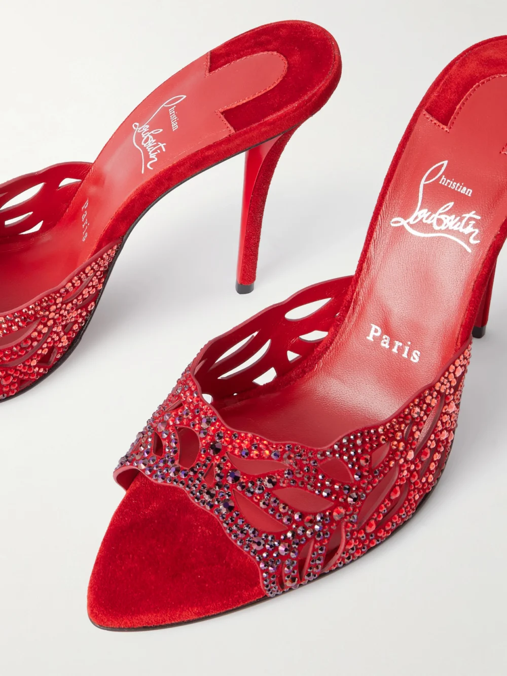 Close-up detail of the Christian Louboutin Lasera 100 Cutout Crystal-embellished Suede Sandals