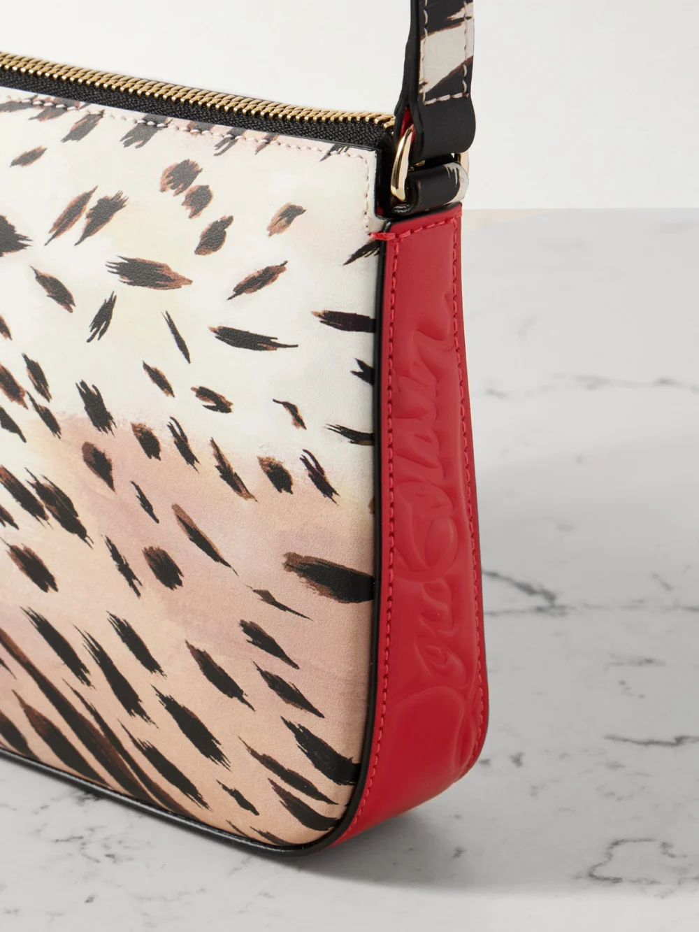 Close-up detail of the Christian Louboutin Loubila Leopard-print Leather Shoulder Bag