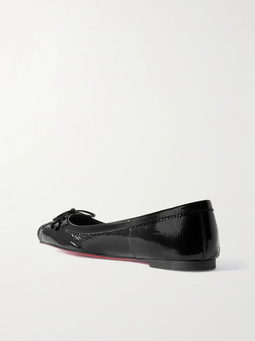 Back view of the Christian Louboutin Mamadrague Crinkled Patent-leather Ballet Flats