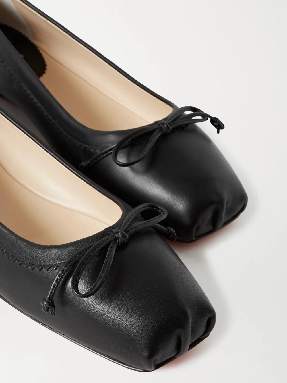 Close-up detail of the Christian Louboutin Mamadrague Leather Ballet Flats