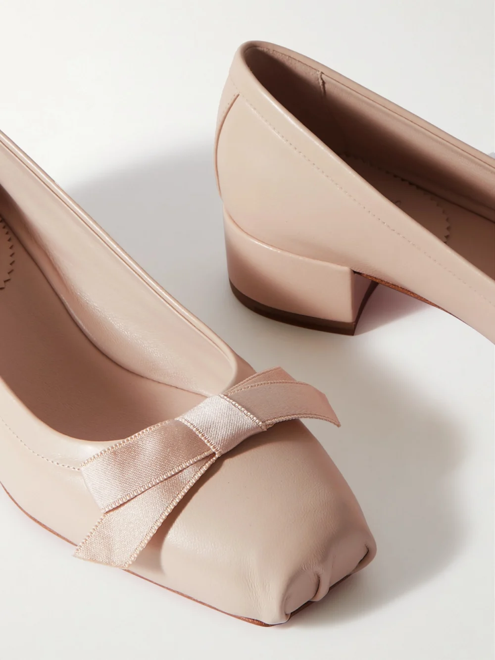 Close-up detail of the Christian Louboutin Mamaflirt 30 Bow-embellished Leather Ballet Pumps