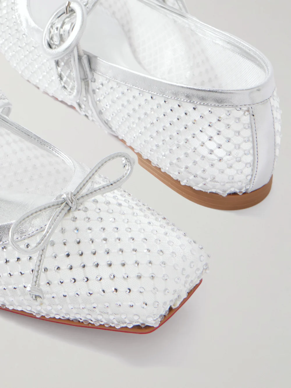 Close-up detail of the Christian Louboutin Mamastrapitina Crystal-embellished Leather-trimmed Mesh Ballet Flats
