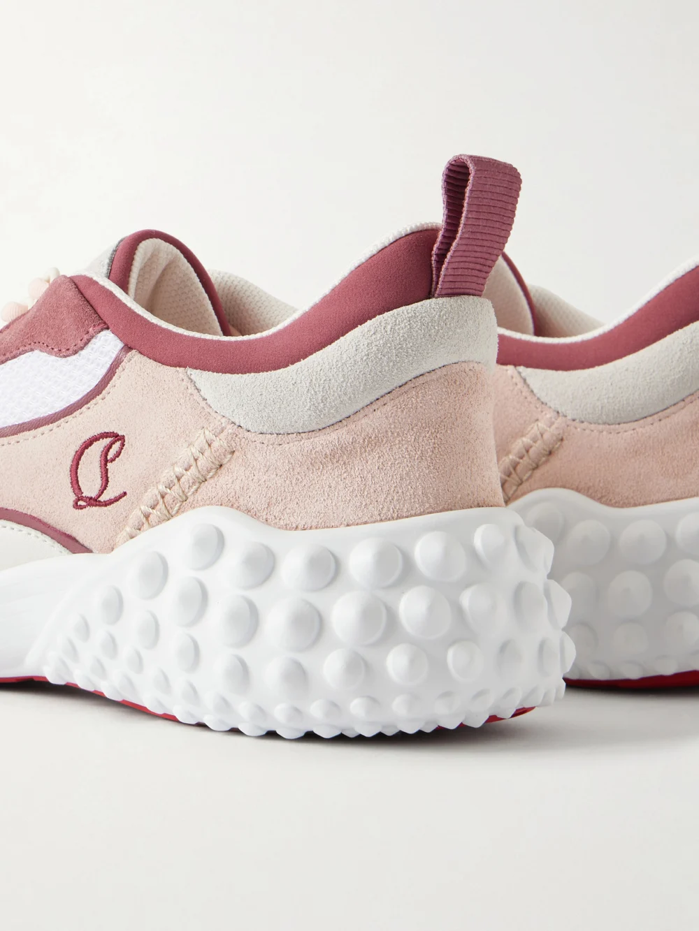 Close-up detail of the Christian Louboutin Mara Leather-trimmed Sneakers