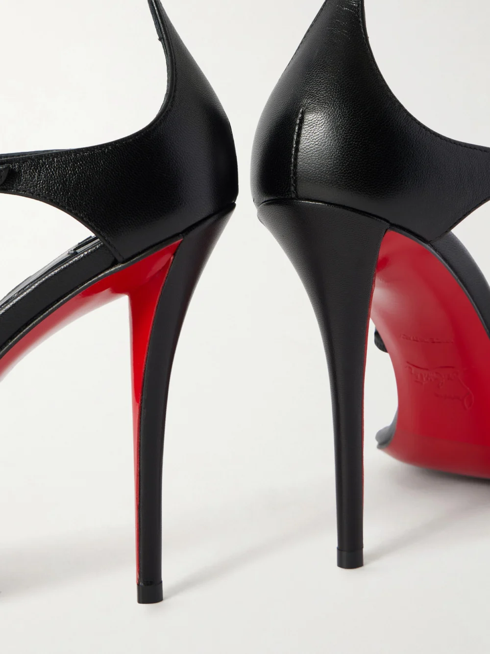 Close-up detail of the Christian Louboutin Millennium Buckled Leather Sandals