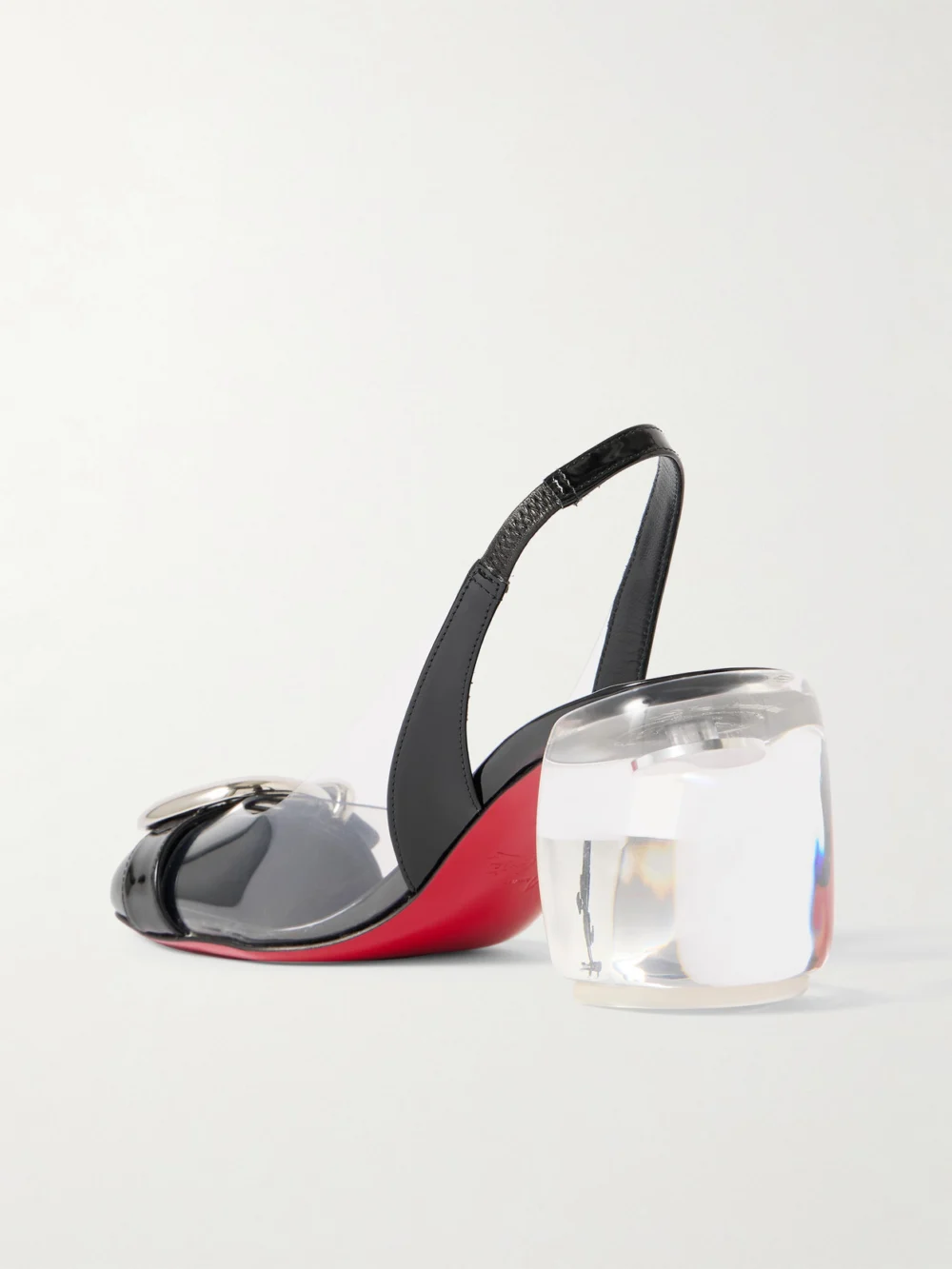 Back view of the Christian Louboutin Minny Bubble 70 Buckled Glossed and Pvc Slingback Pumps