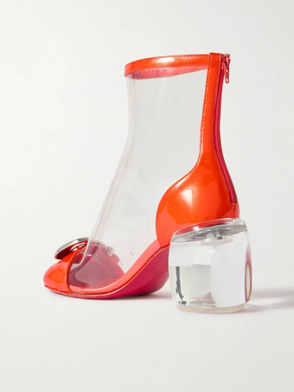 Back view of the Christian Louboutin Minny Bubble 70 Buckled Pvc Ankle Boots