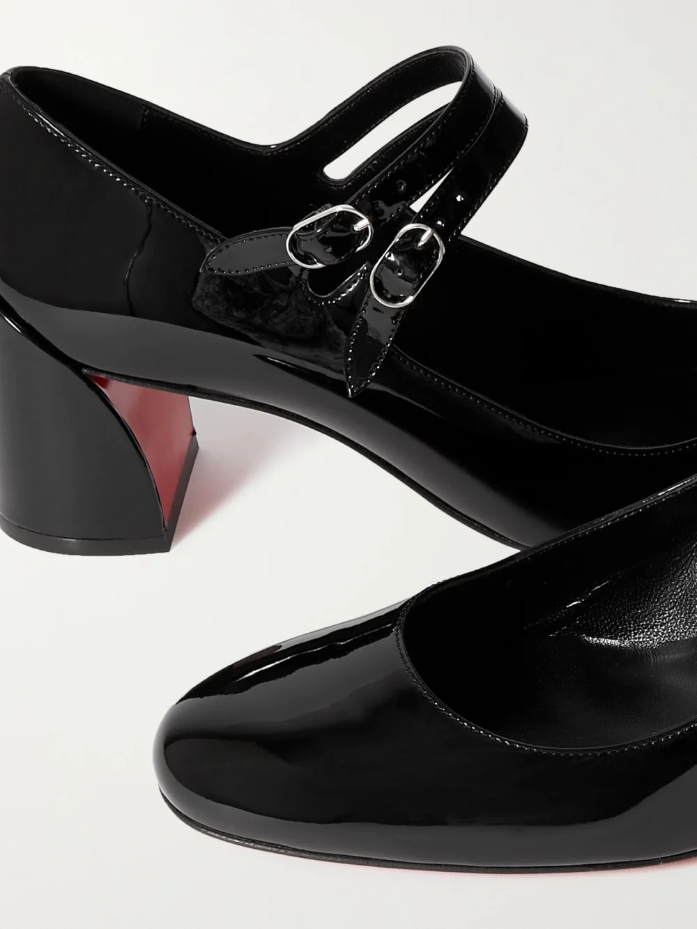 Close-up detail of the Christian Louboutin Miss Jane 55 Patent-leather Pumps