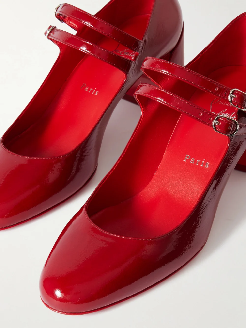 Close-up detail of the Christian Louboutin Miss Jane 55 Patent-leather Pumps