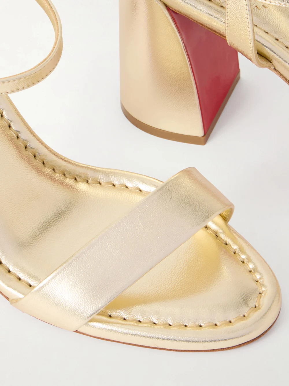 Close-up detail of the Christian Louboutin Miss Jane 85 Metallic Leather Sandals